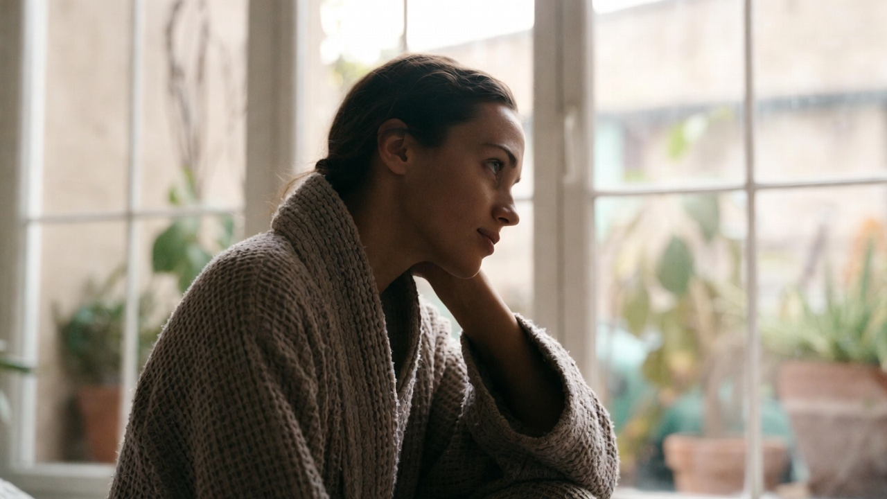 Woman reflecting on her wellness